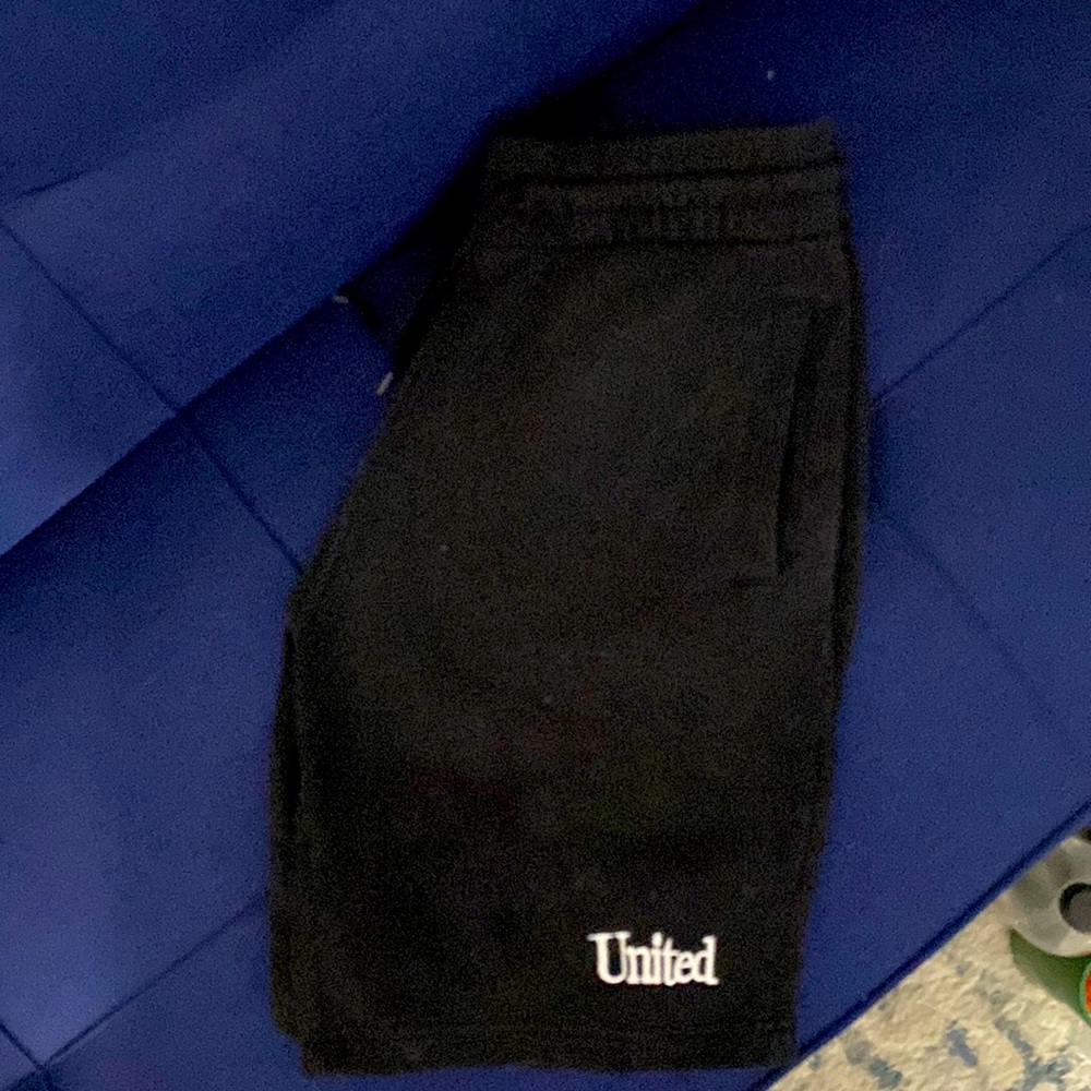 DIVIDES shorts with United 🌈 design